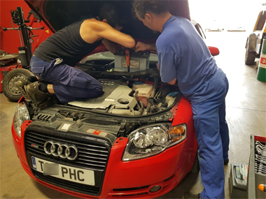 Audi A4 Cabriolet has very heavy new battery fitted requiring 2 mechanics Audi A4 with new battery